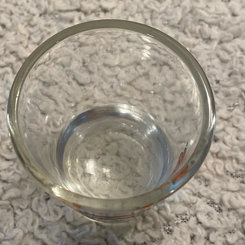 Hooter’s shot glass,  white orange with owl logo, no city specified